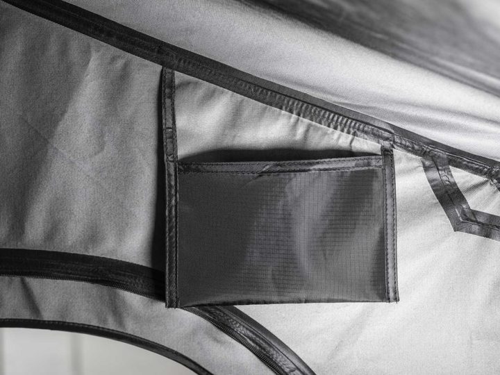 A storage pocket sewn inside the tent