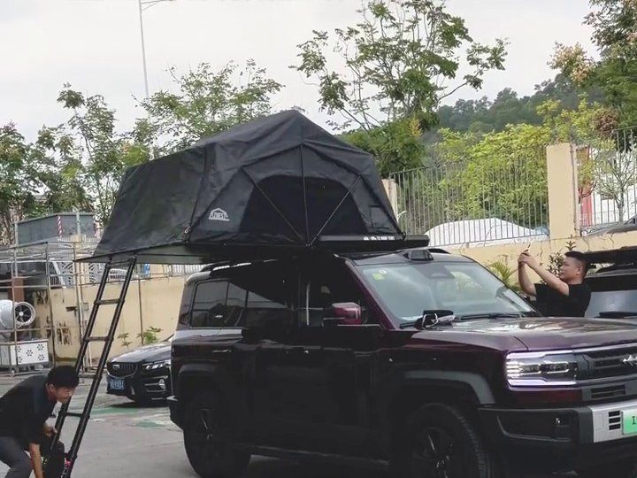 Front of a Fangchengbao Leopard 5 with the roof tent open