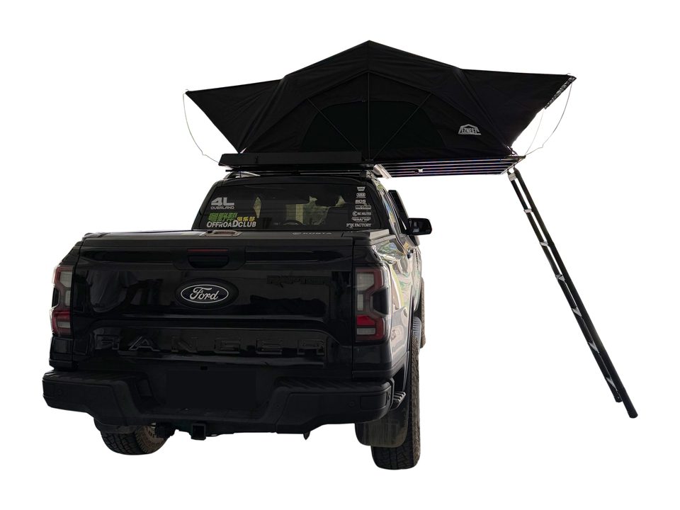 Mini-size roof tent open on the back of a Ford Ranger