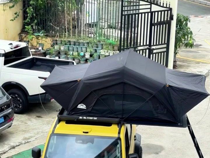Roof tent open on a yellow GWM Tank 300